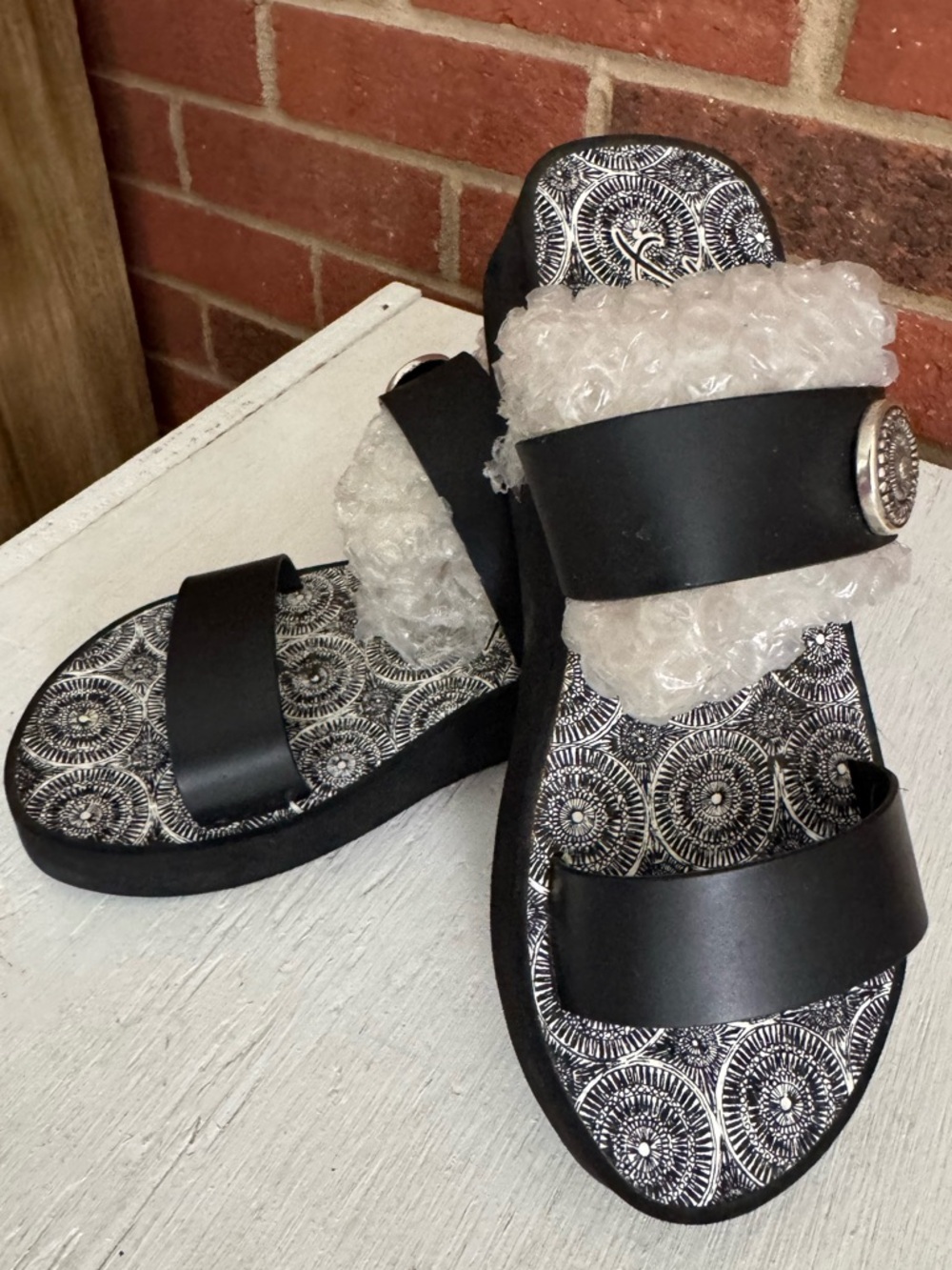 Brighton Black Double-Strap Slide Sandals with Decorative Medallion